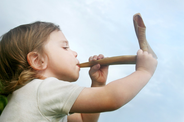 Child blowing sofar