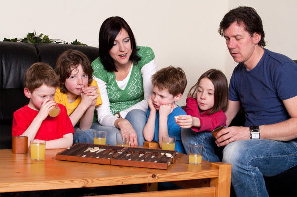 Family playing board games