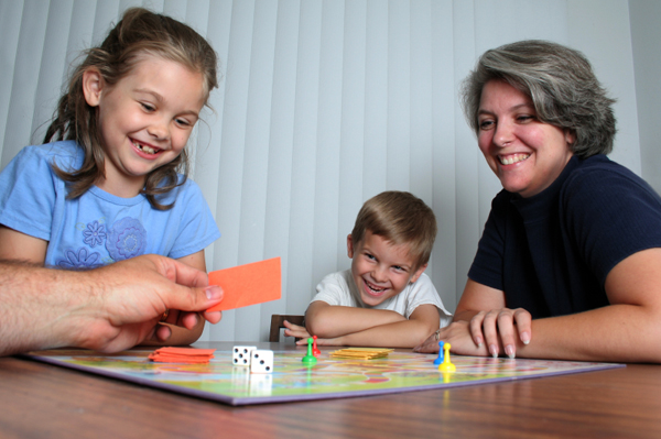 Family playing monopoly