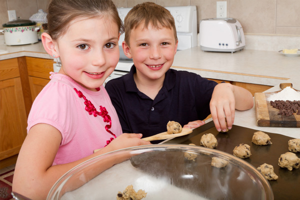 Kids baking cookies