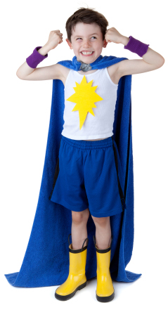 Little boy in superhero costume