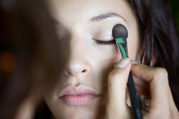 Makeup artist doing fall makeup