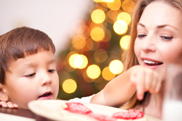Mom and son with Christmas cookies