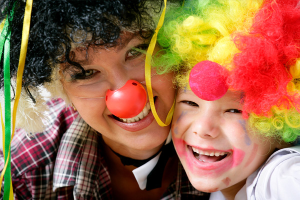 Mom and son dressed as clowns