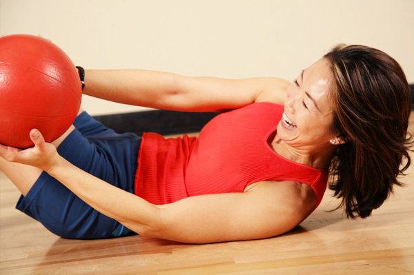 Woman with medicine ball