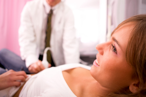 Woman getting early ultrasound