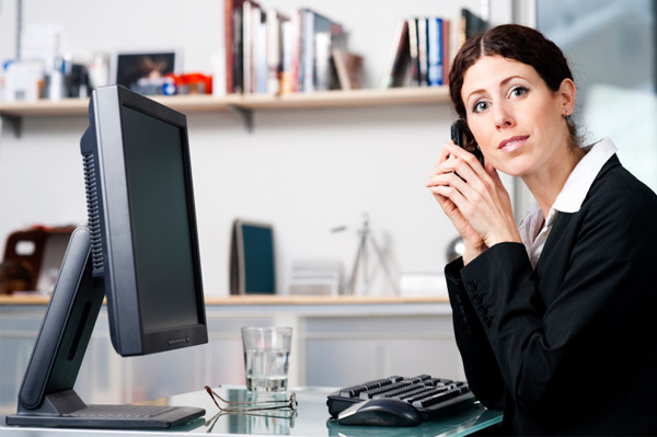 Woman on phone in office