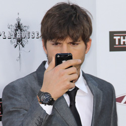 Ashton Kutcher on cell phone