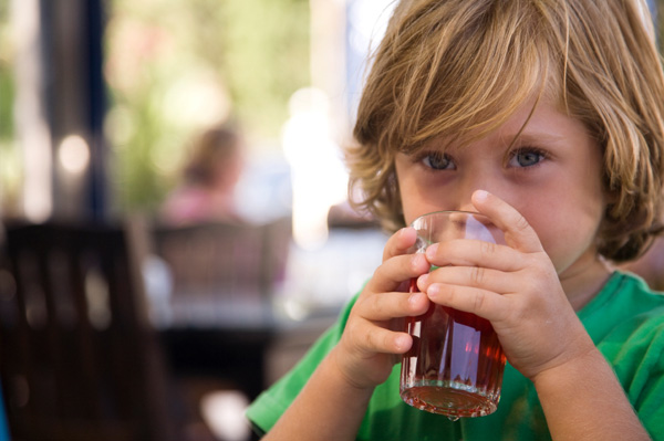 Boy drinking juice