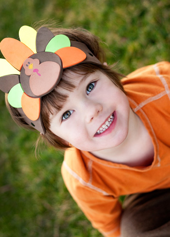 Boy wearing Thankgiving hat