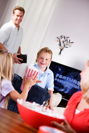 Family preparing to watch DVD