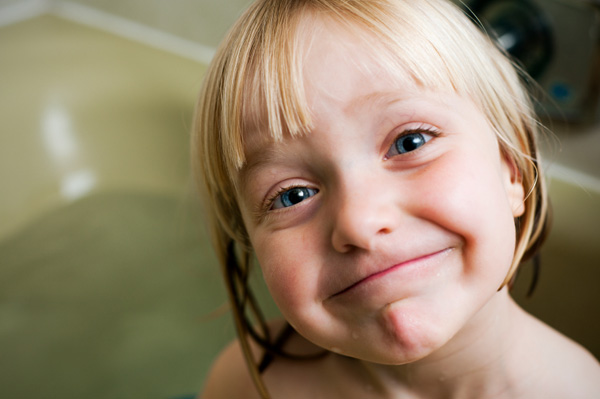 Happy preschooler in tub