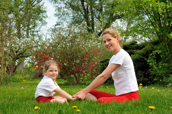Mom and preschooler doing yoga