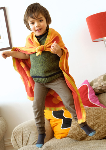 Preschooler jumping on couch
