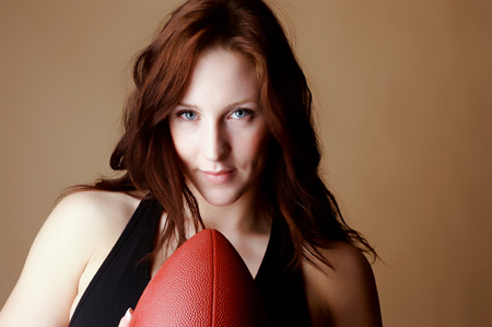 Sexy girl with football
