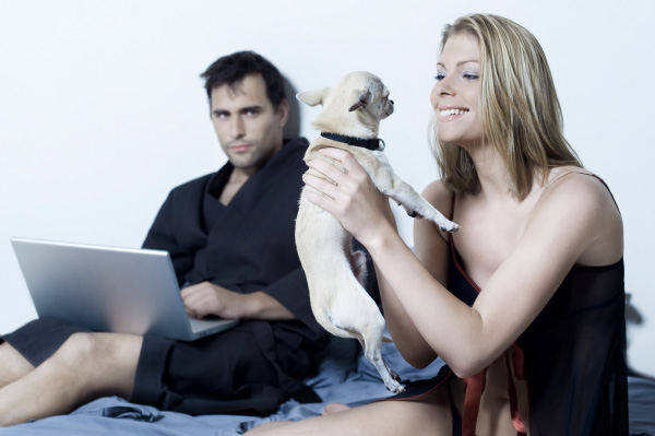 Unhappy man whose girlfriend has gotten a dog