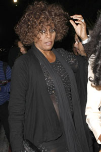Whitney Houston fights with flight crew