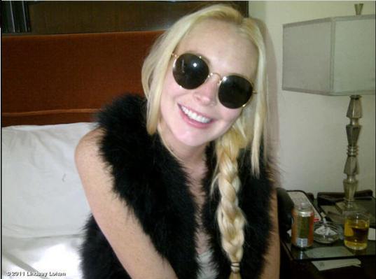 Lindsay Lohan takes new pearly whites to J Edgar after party