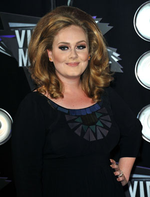 Adele doing well after throat surgery
