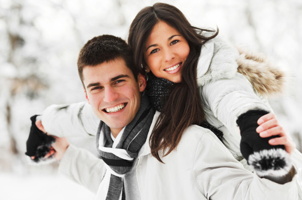 Couple playing in snow