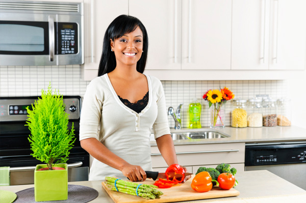 Woman chopping vegetables
