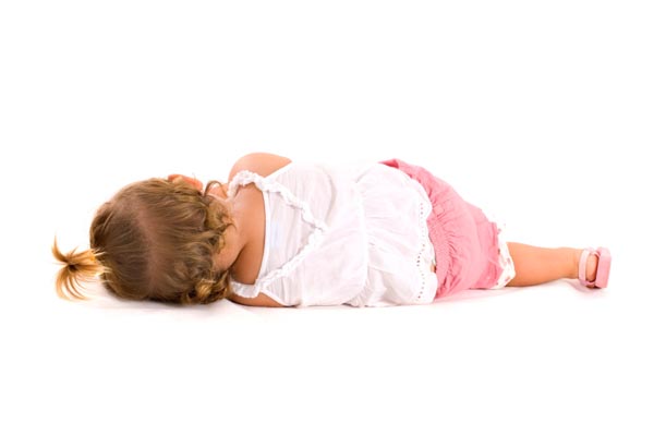 Toddler sleeping on floor