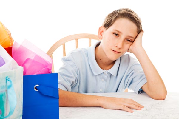 Boy disappointed with his gift