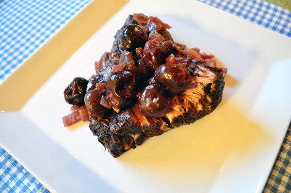 Slow cooked cherry pomegranate pork loin