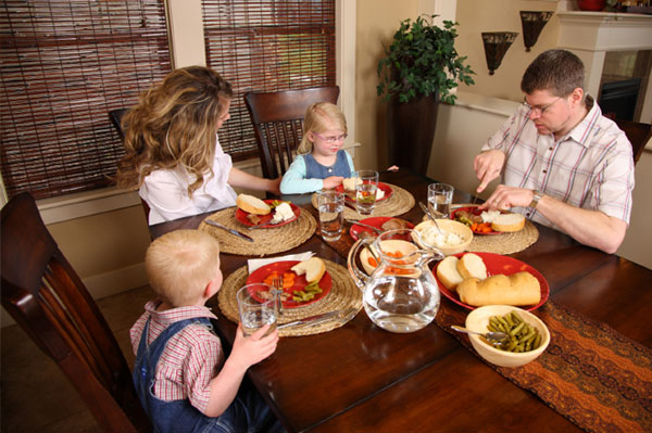 Family eating dinner together 