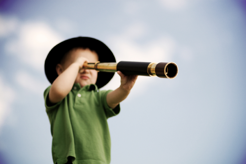 boy with scope, blue sky, boy looking through monocular