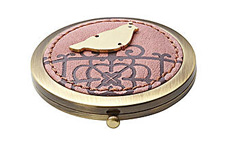 vintage-inspired mirror (fossil.com, $28),