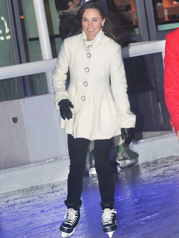 Pippa Middleton on ice skates wearing a Dom&Ruby coat