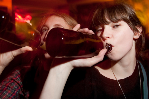 Teen drinking at New Year's Eve party