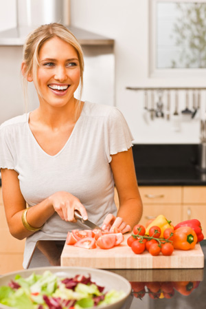 Woman chopping vegetables