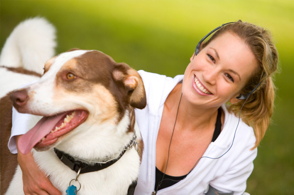 Woman exercising with dog