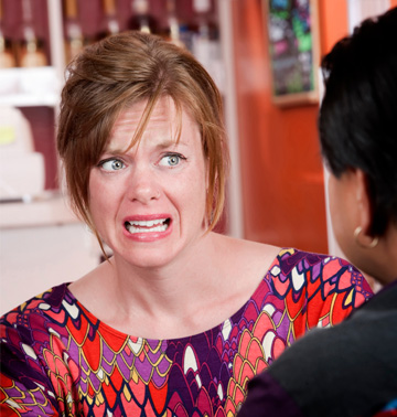 Appalled woman on date