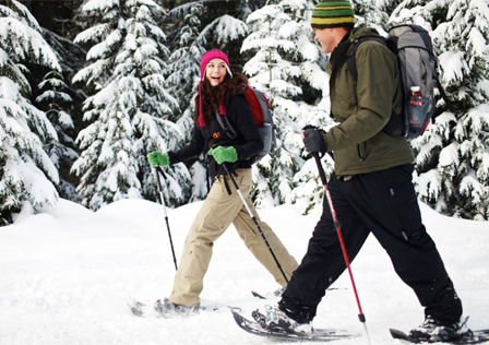 Couple snowshoeing in winter