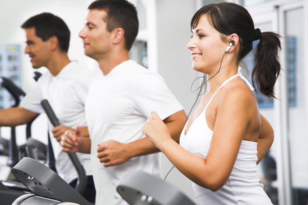 Friends running in health club