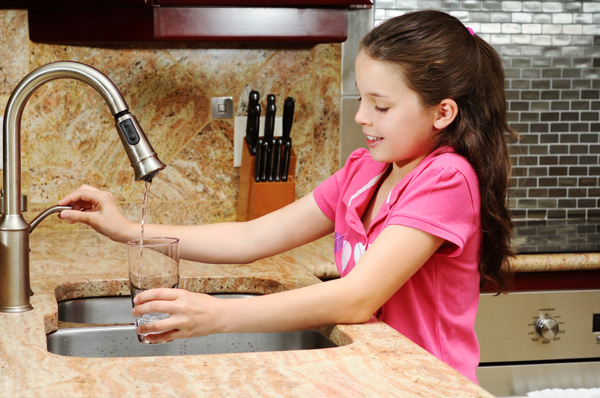Girl drinking tap water