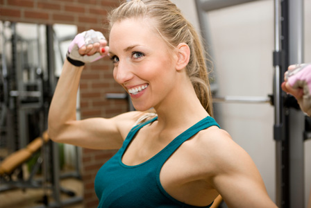 Happy woman flexing