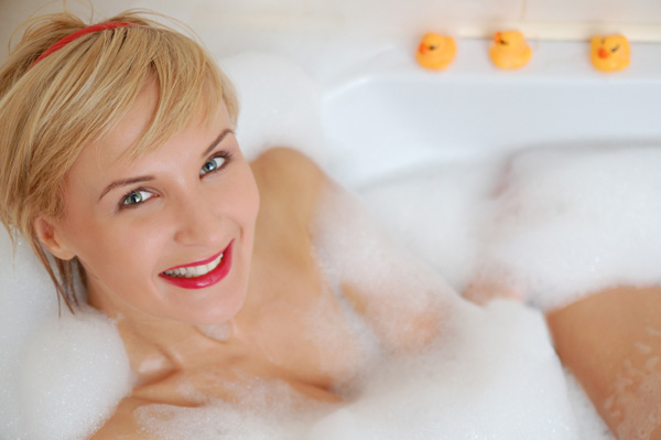 Woman taking relaxing bath