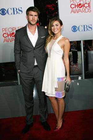 Miley Cyrus and Liam Hemsworth at the People's Choice Awards