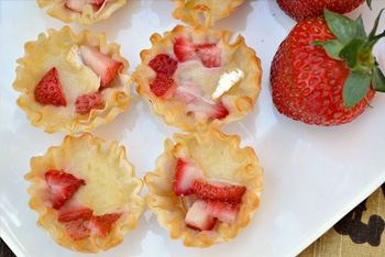 Mini strawberry, honey and brie tarts