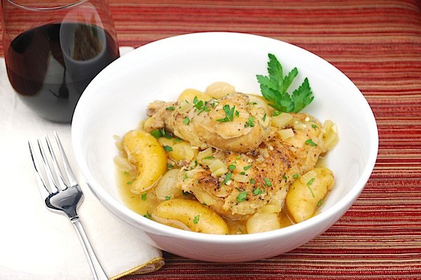 Slow-cooked chicken and potatoes in white wine sauce