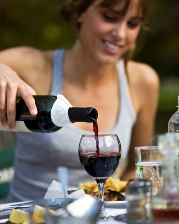 Woman pouring wine