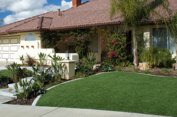 house with an artificial lawn