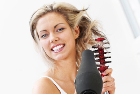 http://cdn.sheknows.com/articles/2012/02/horiz-woman-with-hair-dryer-and-brush.jpg