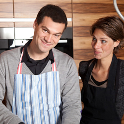 Man cooking for wife