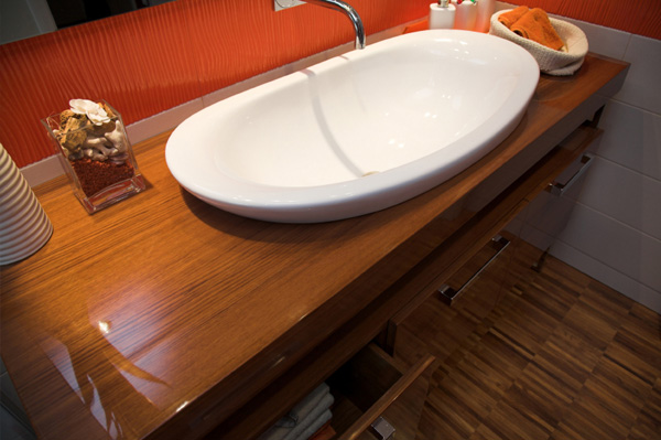 modern looking wood counter bathroom