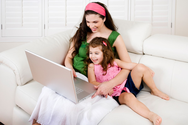 Mother and daughter on computer